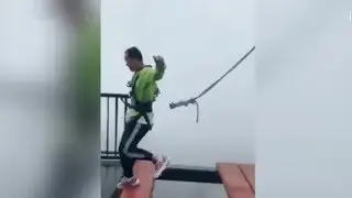 Safety cord falls off harness as man hops on high bridge in SW China
