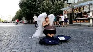 Angel girl plays in the city Prague on Hang Drum (KeyRa), Александра Зиборова from Psyfamily, Moscow