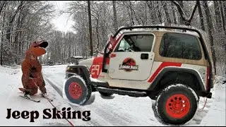 T-Rex SKIS behind JURASSIC PARK JEEP (inflatable T-Rex costume)