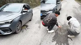 Two kind-hearted guys saw the puddle on the road and found materials to repair it.