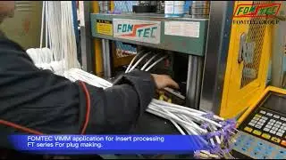 Plug over molding on standard vertical injection molding machines