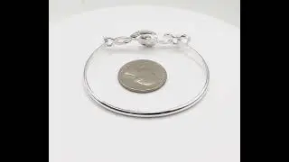 JOJI BOUTIQUE: Shiny Silver Treble Clef Bangle