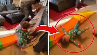 Kid Falls Over During Christmas Present Reveal! (Funny Baby Fails Video)