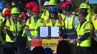 Whitmer signs long-term road funding bill in Clinton Township