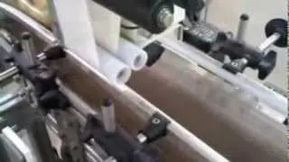 Top and Bottom Clamshell Labeler on Bakery Products
