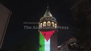 Istanbul's iconic Galata Tower illuminated with colors of the Palestinian flag