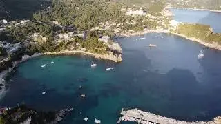 Aerial view of Paleokastritsa bay and monastery, Corfu, Greece, August 2021