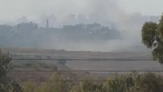 Smoke on Gaza skyline seen from Israel