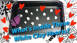 Breaking White Clay Hearts to Reveal Hidden Marbles