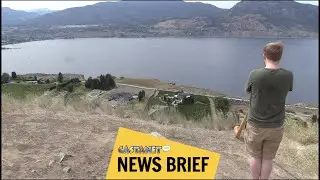 Alphorn musician plays over the Okanagan