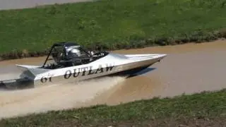 Justin Roylance in Outlaw coming out of the water