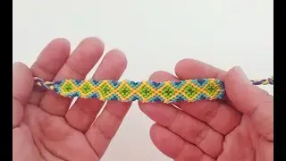 PULSERA dise&ntilde;o ROMBO MULTICOLOR de hilo con dos nudos.