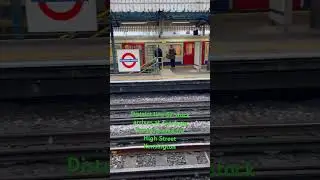 District line S7 stock arrives at Turnham Green headed for High Street Kensington