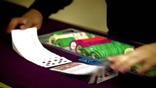 Royalty Free Stock Footage of Preparing cards to shuffle onto casino table