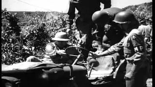 Henry L. Stimson and Lieutenant General Mark W. Clark watch firing of guns at an ...HD Stock Footage