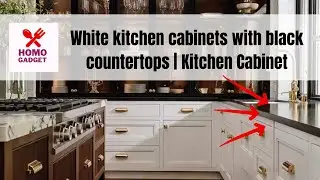 White kitchen cabinets with black countertops
