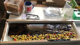 300 lego heads in a resin serving board