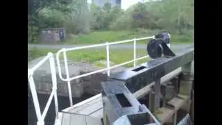 Walking Over the Old Kilpatrick Lock on the Forth & Clyde Canal in Scotland