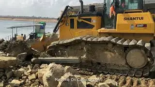 Shantui DH17-c2 Bulldozer Extreme Pushing Stone To Preparing Boundary Road For Development Area.