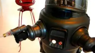 Osaka Tin Toy Institute Robby the Robot (1996) and Schylling Martian Invader