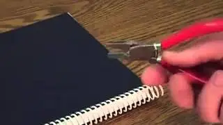 Book making with plastic coil crimping tool and spiral coils