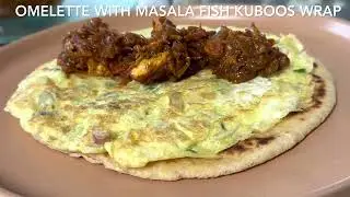 Omelette with Masala Fish in Kuboos Wrap