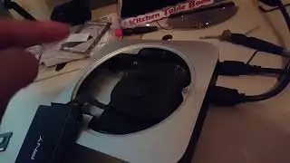 Mac mini not booting up, black screen, fans spinning high rpm