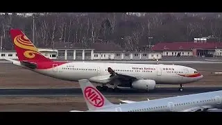 Hainan Airlines HU489 Airbus A330-243 B-6118 landing taxiing to terminal gate Berlin Tegel 13.3.15