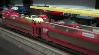 Lima Class 33 EWS pulling Bachmann STVA Weathered Car Transporters