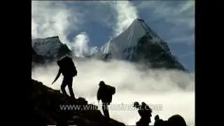 Climbers with Bhagirathi peaks in background