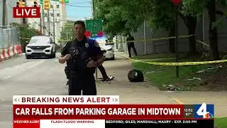 Car falls from parking garage