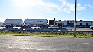 Watching double trailer trucks on Hwy 2 near Red Deer, AB