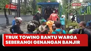 Truk Towing Bantu Warga Seberangi Genangan Banjir di Kawasan Sunter #Beritasatu