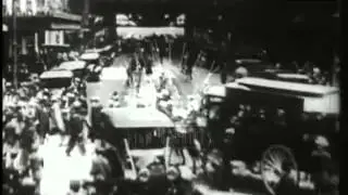 Chicago early 1920's.  Street with car and people, U.S.A. Film 90540