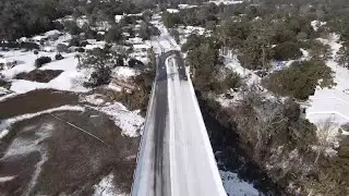 Drone video shows Thunderbolt, Ga. after snowfall