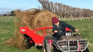 Total Feed Solutions - Round Bale Feeder on Quad Bike