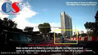 Cyclist With Kid Failed To Conform To Traffic Red Light And Cycle On Rightmost Lane