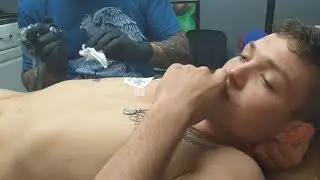 Daniel getting his rib tattoo pt 1