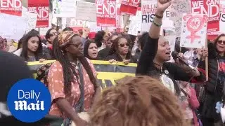 Women walk through London streets to protest against violence - Daily Mail
