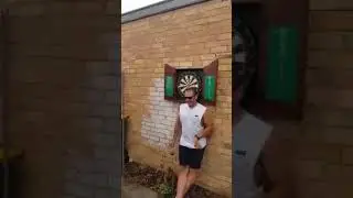 Drunk Guy Throws Dart Over Friends Head - 1012703