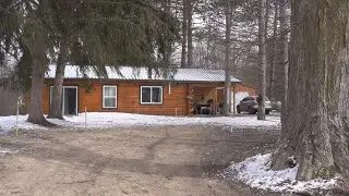 West Michigan man thanks community for log cabin home