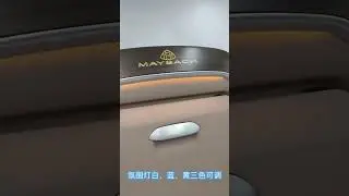 Car seat back electric multifunctional folding table with ambient light