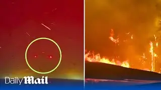 Dashcam footage: Car drives through massive wildfire in Canada