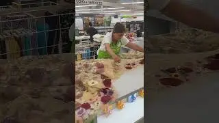 At Joann Fabric Cutting Counter
