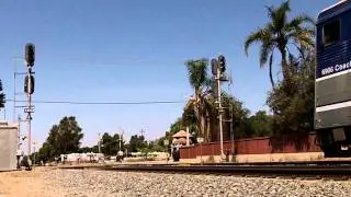Amtrak 6906 leads 573 past Sand Canyon Ave.