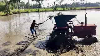 Tractor Video - Mini 2 VST Shakti Vs Mahindra Tractor Puddling with Bell Boy Leveling the Mud Field!