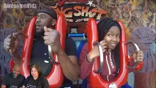 Guys passing out Slingshot Funny Ride.  Reaction