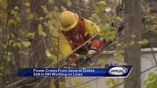 Utility workers continue work to restore power, nearing completion