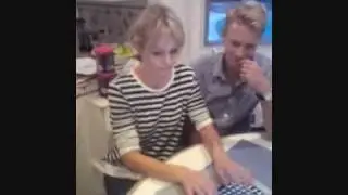 Izabella Scorupco helping stupid guy with computer problem