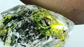 Enhydro Fluorescent Petroleum Quartz Crystal